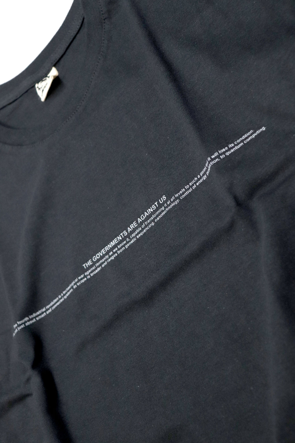THE GOVERNMENTS ARE AGAINST US USED BLACK T-SHIRT
