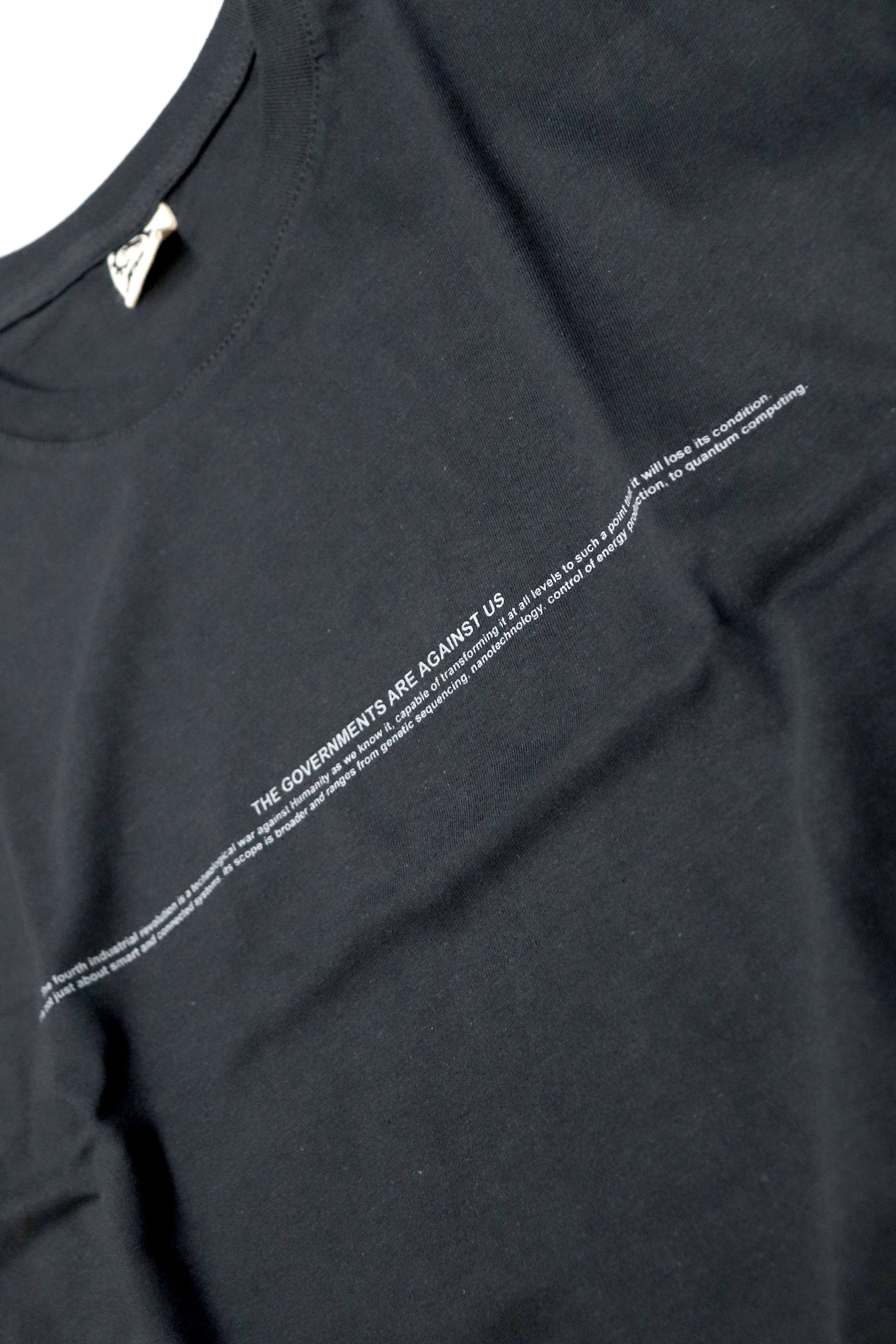 THE GOVERNMENTS ARE AGAINST US USED BLACK T-SHIRT
