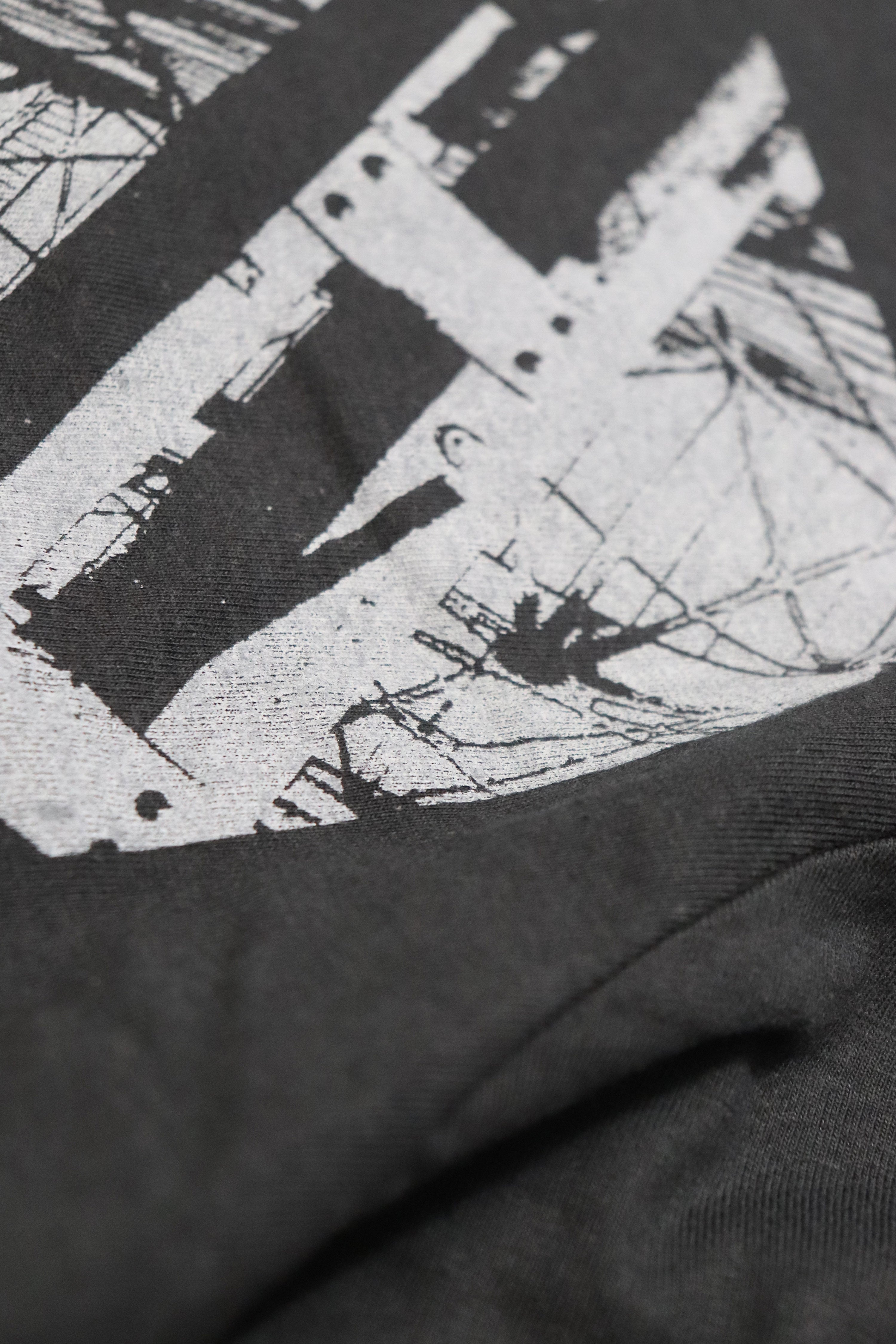 THE GOVERNMENTS ARE AGAINST US USED BLACK T-SHIRT