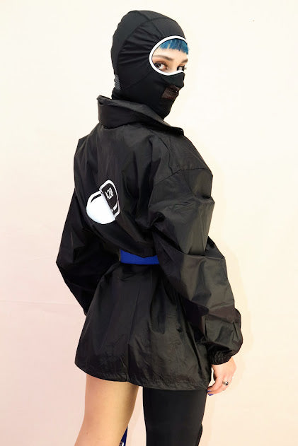 SELF CARE DIVISION BLACK WINDCOAT