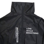 SELF CARE DIVISION BLACK WINDCOAT